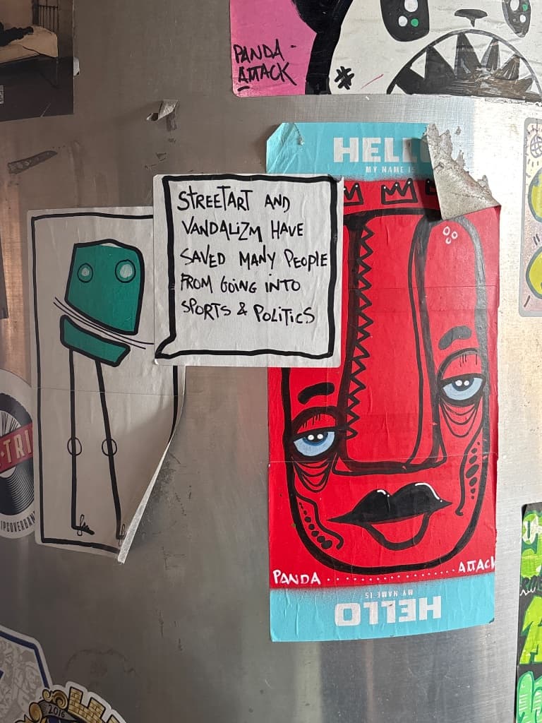 Streetart and vandalizm (by @pand_a_ttack) sticker in Copenhagen