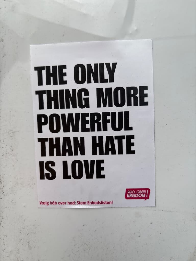 The only thing more powerful than hate is love sticker in Copenhagen