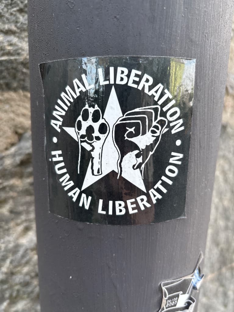 Animal liberation human liberation sticker in Stockholm